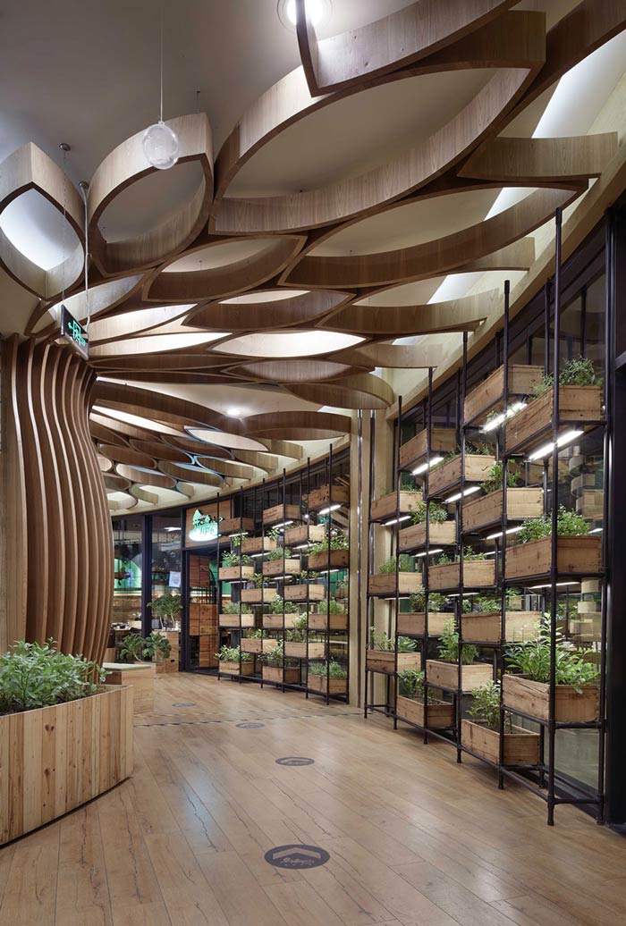 特色生態(tài)餐廳入口過道裝修設計效果圖