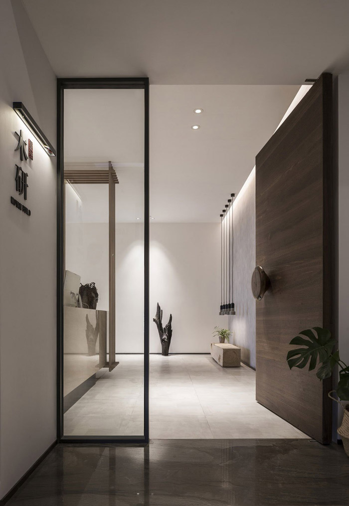 新中式風(fēng)格辦公室進(jìn)門(mén)區(qū)設(shè)計(jì)效果圖